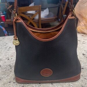 Dooney & Bourke Black and Tan Hobo Bag